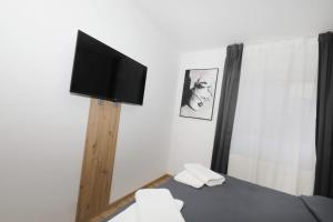 TV/trung tâm giải trí tại Arena Prestige