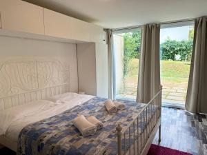 Posteľ alebo postele v izbe v ubytovaní Villa Amedea