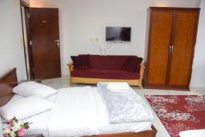 Postel nebo postele na pokoji v ubytování NEW ASSER HOTEL PYRAMID