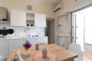 Kuchyň nebo kuchyňský kout v ubytování Hotel Maremma Sul Mare