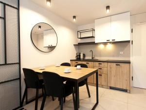 Kuchyňa alebo kuchynka v ubytovaní Apartament 420 Green Port Basen & Jacuzzi Kołobrzeg