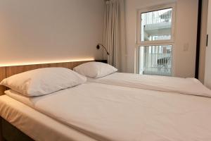 Posteľ alebo postele v izbe v ubytovaní Apartament 420 Green Port Basen & Jacuzzi Kołobrzeg