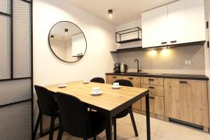 Kuchyňa alebo kuchynka v ubytovaní Apartament 420 Green Port Basen & Jacuzzi Kołobrzeg