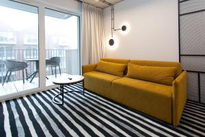 Posedenie v ubytovaní Apartament 420 Green Port Basen & Jacuzzi Kołobrzeg