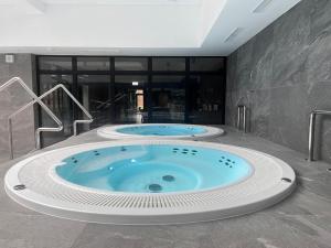 Fotografia z galérie ubytovania Apartament 420 Green Port Basen & Jacuzzi Kołobrzeg v destinácii Kołobrzeg