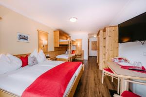 Postel nebo postele na pokoji v ubytování Hotel Brückenwirt Superior