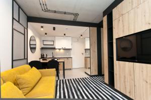 Kuchyňa alebo kuchynka v ubytovaní Apartament 420 Green Port Basen & Jacuzzi Kołobrzeg