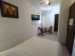 Postel nebo postele na pokoji v ubytování Hotel Rath