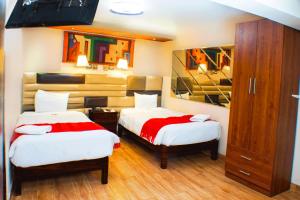 Katil atau katil-katil dalam bilik di Hotel Royal Qosqo