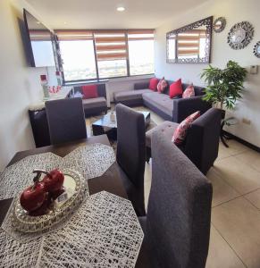 Гостиная зона в Departamento Doble con vista a la ciudad y Rio