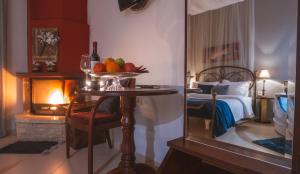 A bed or beds in a room at Asteras Hotel