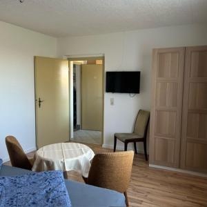 Μια τηλεόραση ή/και κέντρο ψυχαγωγίας στο Apartment 1