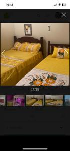 ein Video von einem Schlafzimmer mit 2 Betten in einem Zimmer in der Unterkunft casa da maria in Cabo Frio