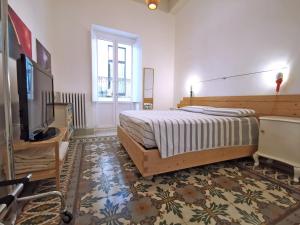 Posteľ alebo postele v izbe v ubytovaní L'Officina