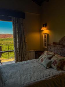 Giường trong phòng chung tại La Casa De La Bodega - Wine Boutique Hotel