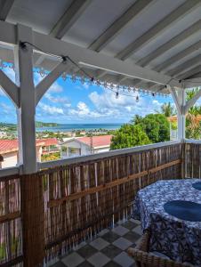 Balkón nebo terasa v ubytování Studio Frangipani dans Villa Fleurs des Iles
