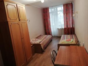 Postel nebo postele na pokoji v ubytování ГОТЕЛЬ Заводу 410 ЦА