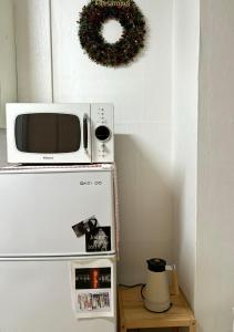 Η κουζίνα ή μικρή κουζίνα στο Tage House +3 φωτογραφίες