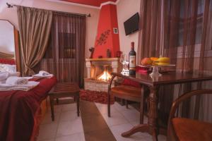 A bed or beds in a room at Asteras Hotel