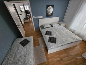 Ένα ή περισσότερα κρεβάτια σε δωμάτιο στο Sleep here