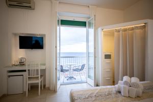 Posteľ alebo postele v izbe v ubytovaní Hotel Ligure