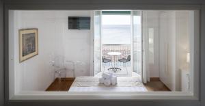 Posteľ alebo postele v izbe v ubytovaní Hotel Ligure