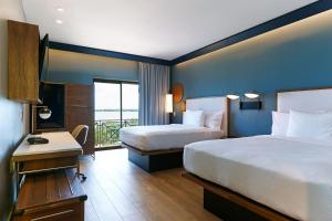 Postel nebo postele na pokoji v ubytování Courtyard by Marriott Paramaribo + 37 fotografií