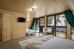 Postel nebo postele na pokoji v ubytování Rusca Retreat + 37 fotografií