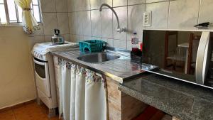 Kuchyň nebo kuchyňský kout v ubytování Kitnet 2 - Caminhos da Joaquina