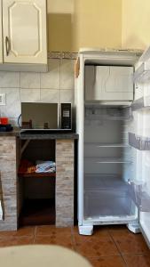 Kuchyň nebo kuchyňský kout v ubytování Kitnet 2 - Caminhos da Joaquina