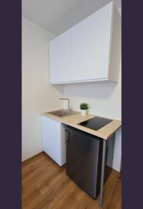 Η κουζίνα ή μικρή κουζίνα στο Calm