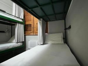 Br Hostel客房内的一张或多张床位