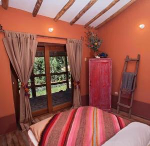 Katil atau katil-katil dalam bilik di SAMAY WASI Rest house