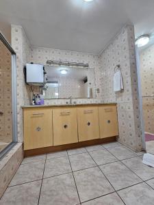 Um banheiro em Flat Garvey Apart-hotel