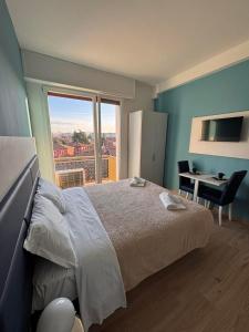 Postel nebo postele na pokoji v ubytování Corte Sant'Orsola 108