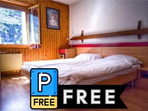 Postel nebo postele na pokoji v ubytování Hotel du Stand