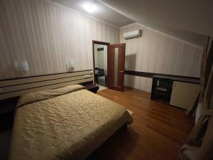 Postel nebo postele na pokoji v ubytování Mini-Hotel in Kharkiv