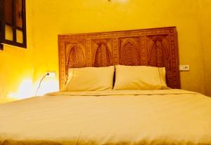 Postel nebo postele na pokoji v ubytování Edwiria Marrakech
