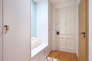 A bed or beds in a room at Le Temps d'une Pause