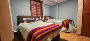 Ένα ή περισσότερα κρεβάτια σε δωμάτιο στο Eco Paria Lodge