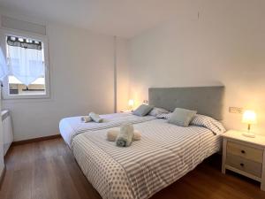 Postel nebo postele na pokoji v ubytování Apartament Escapat Sort - L'Amfitriona