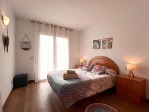 Postel nebo postele na pokoji v ubytování Apartament Escapat Sort - L'Amfitriona
