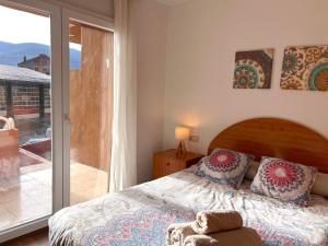 Postel nebo postele na pokoji v ubytování Apartament Escapat Sort - L'Amfitriona