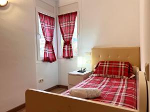 Postel nebo postele na pokoji v ubytování Apartament Escapat Sort - L'Amfitriona