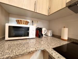 Kuchyň nebo kuchyňský kout v ubytování Apartament Escapat Sort - L'Amfitriona