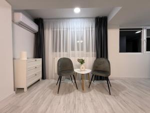 Et opholdsområde på WPP Apartament + 5 billeder