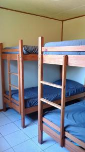 Postel nebo postele na pokoji v ubytování Cabaña Los Laureles