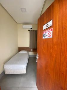 Postel nebo postele na pokoji v ubytování Hotel do Didi