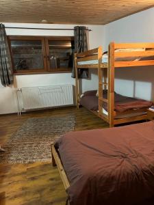 Postel nebo postele na pokoji v ubytování Mikulas Guest House