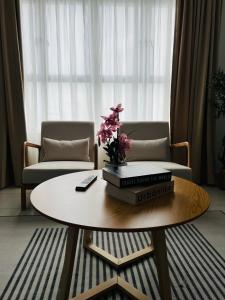 Χώρος καθιστικού στο ARENA KLIA Transit Homestay - Fully Aircond